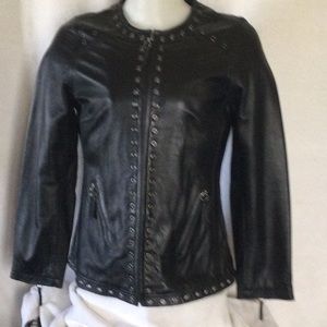 Bradley Bayou black leather lined zippered jacket. Eyelet trim.
